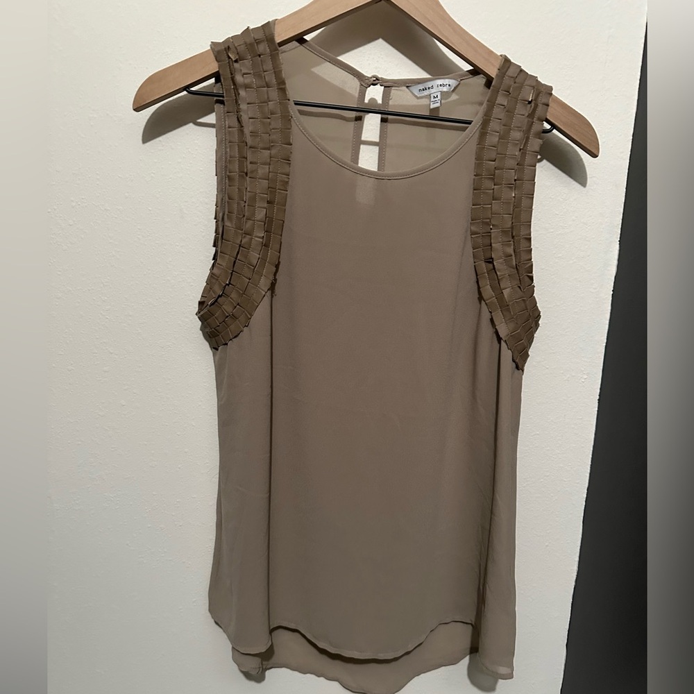 Naked Zebra taupe colored tank.